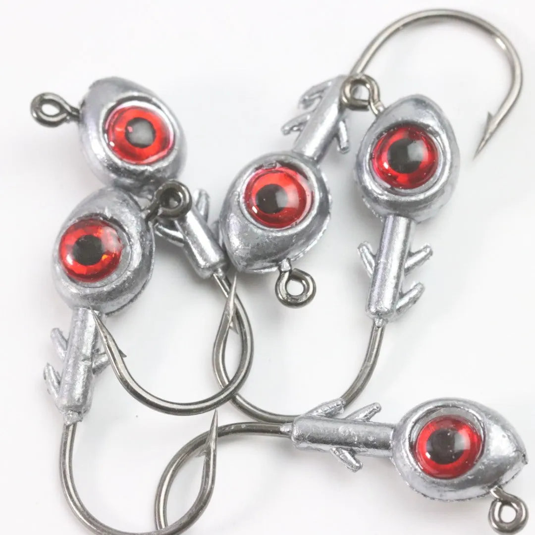 Cambrian Big Eye Fish Head Jig Hook in 10g weight with white eyes on dark background