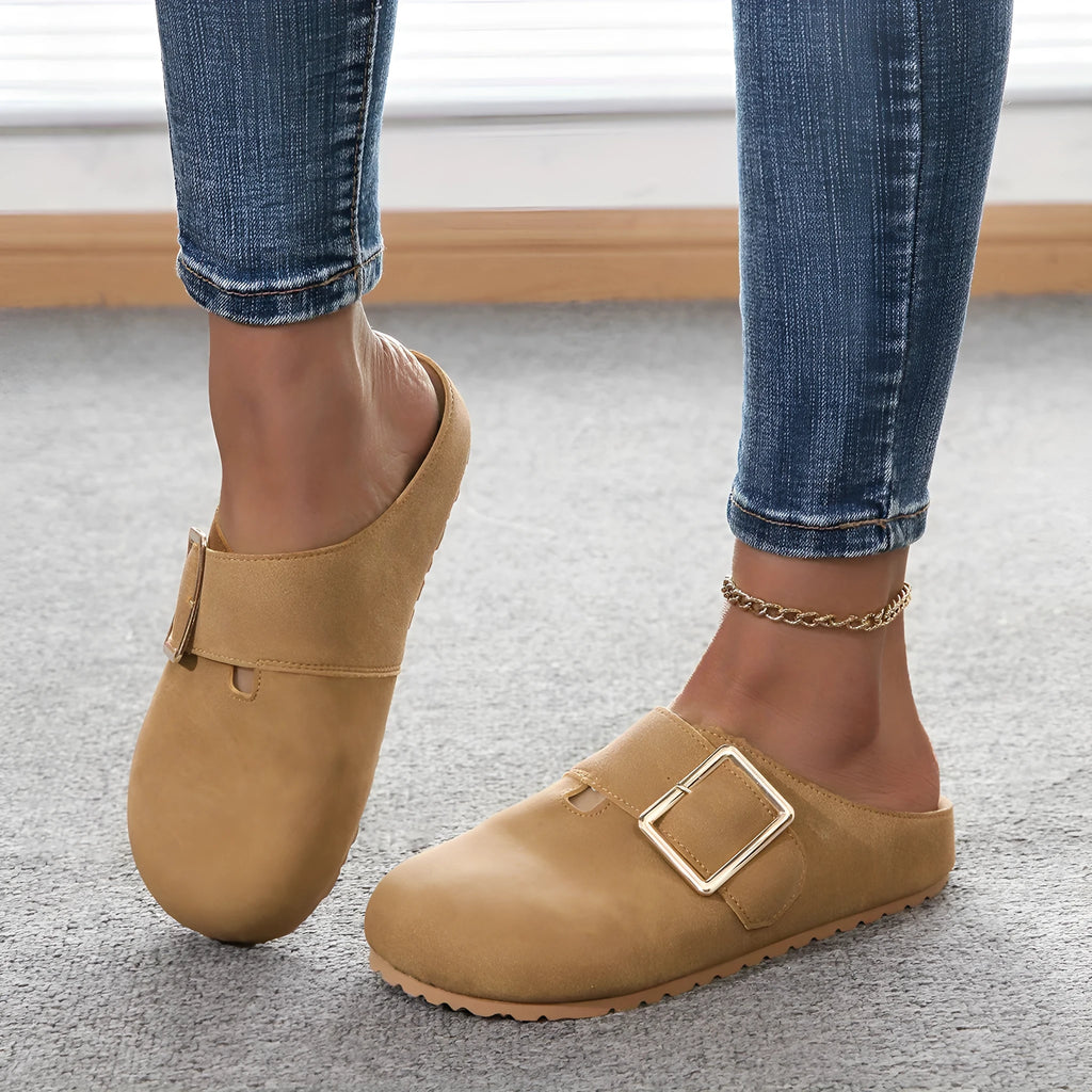 Women's brown closed toe canvas slippers with low top design showing size options