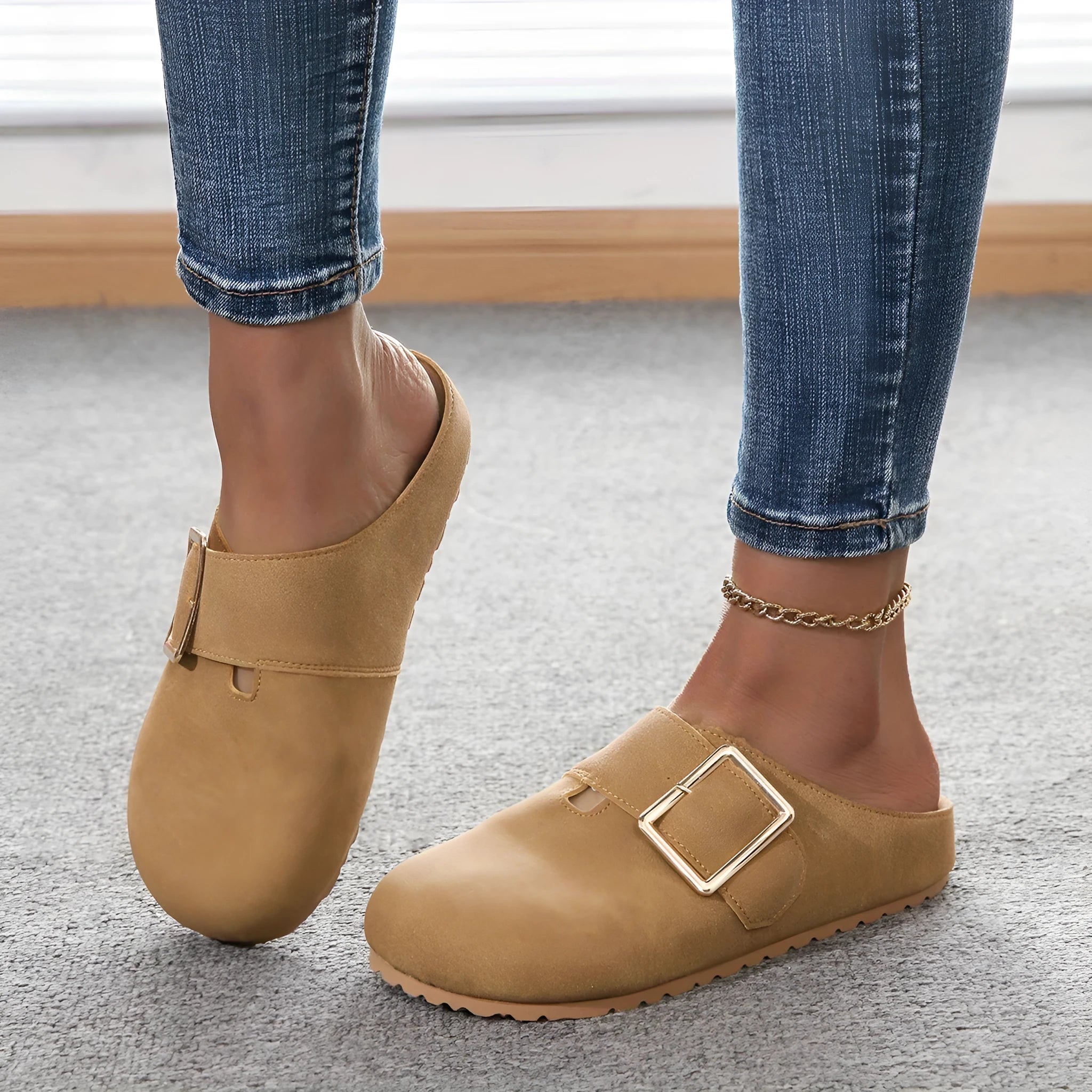 Women's brown closed toe canvas slippers with low top design showing size options