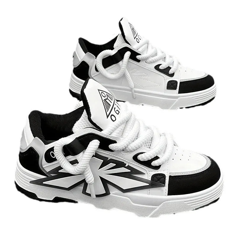 Men's white chunky sneakers with a cartoon pattern, round toe, and thick rubber sole on a plain background.