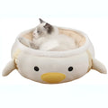 Green chick-shaped cat bed shown both flat as a sofa and hanging as a hammock for a small cat.