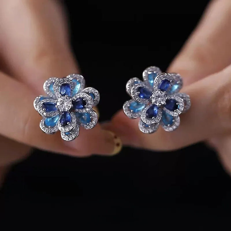Blue flower stud earrings for women with shiny diamond detailing and zinc alloy electroplated construction