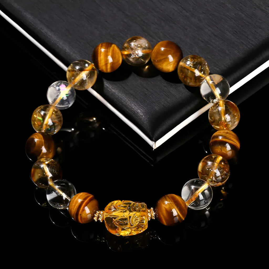 Natural yellow tiger's eye and citrine gemstone bracelet with 10mm beads and a steel Pi Xiu charm.