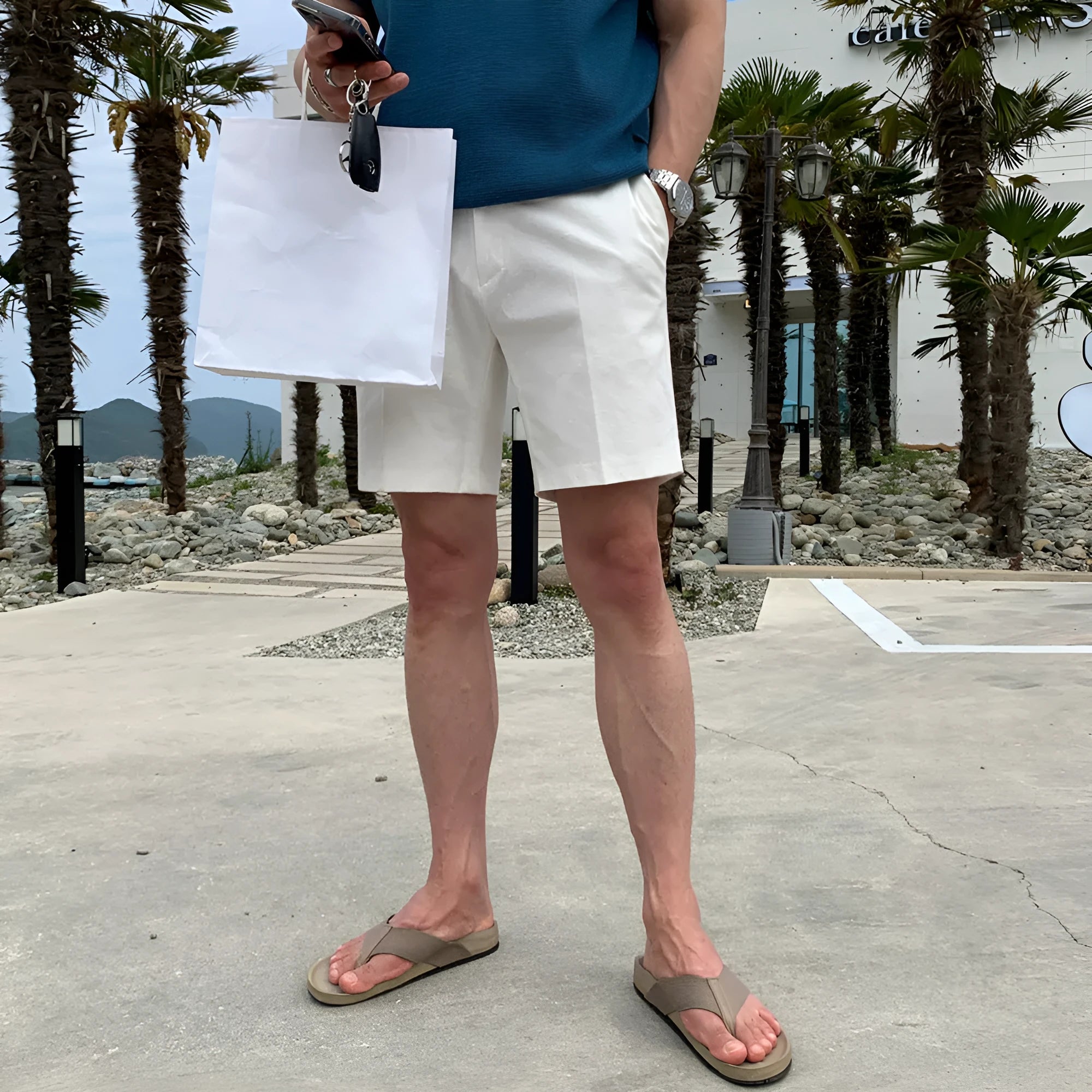 Men's straight-leg casual shorts in khaki, shown laid flat.