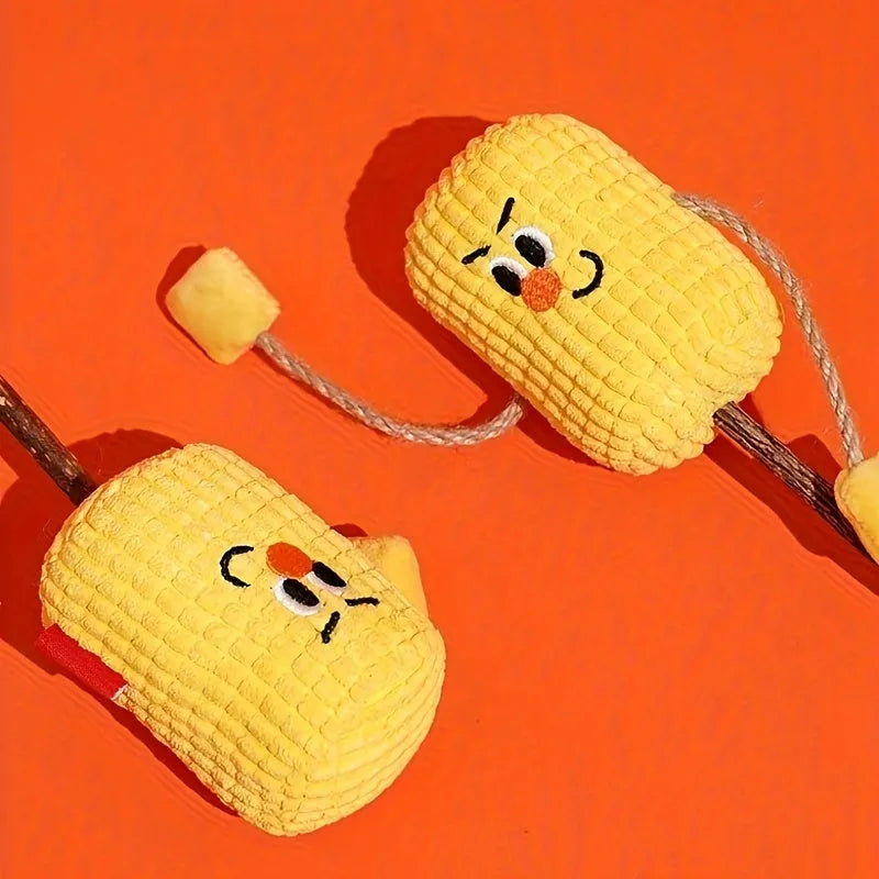 Polio wood corn cob shaped cat chew toy for dental health on a white background.