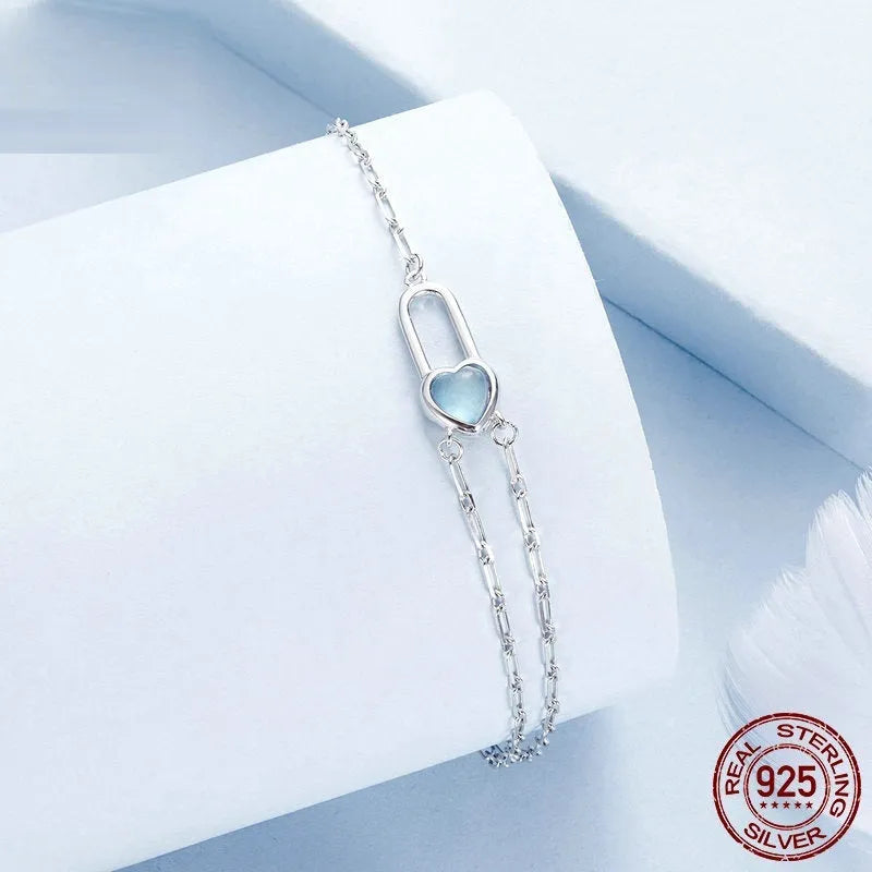 S925 sterling silver heart lock bracelet for women with electroplated finish on white background