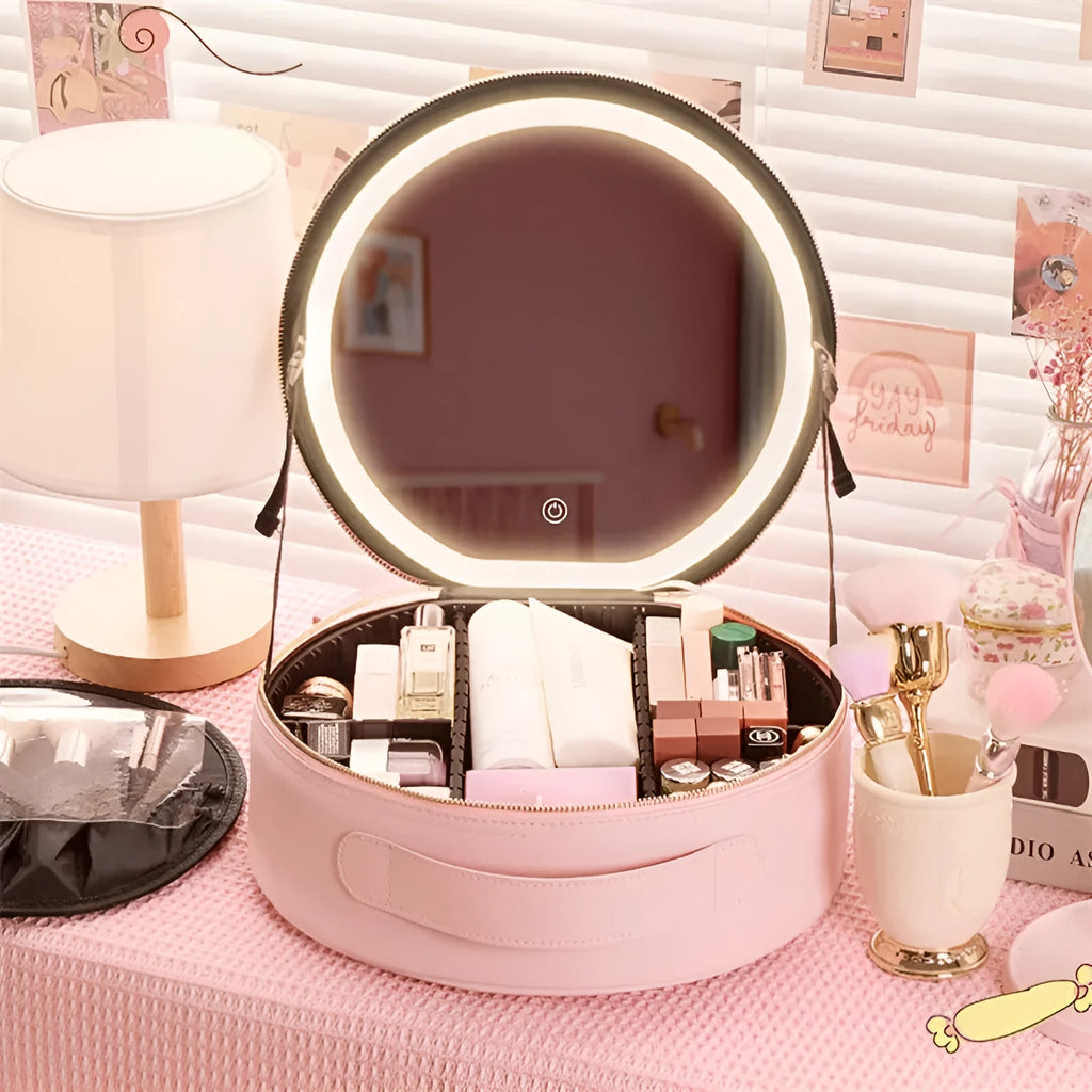 Round pink PU leather makeup bag with built-in LED illuminated mirror and internal cosmetic partitions open.