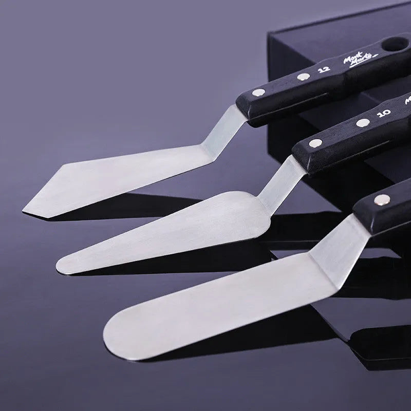 Three stainless steel oil painting scrapers showing No. 3, No. 10, and No. 12 palette knives