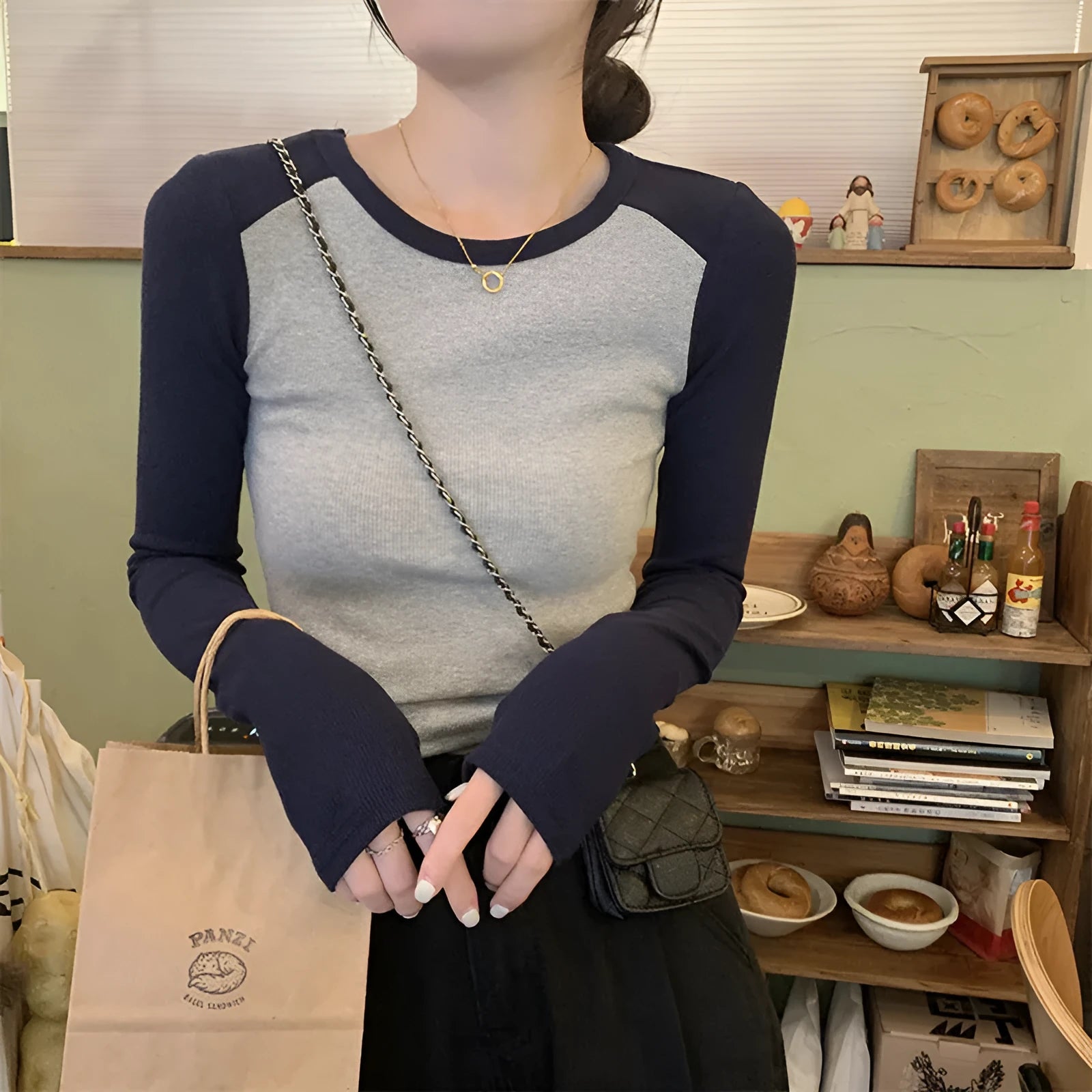 Oversized women's casual top with embroidery on princess sleeves in viscose fabric