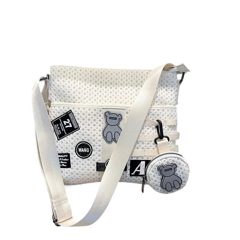 Mesh crossbody bag large capacity white net horizontal square shape with slit pocket and single shoulder strap