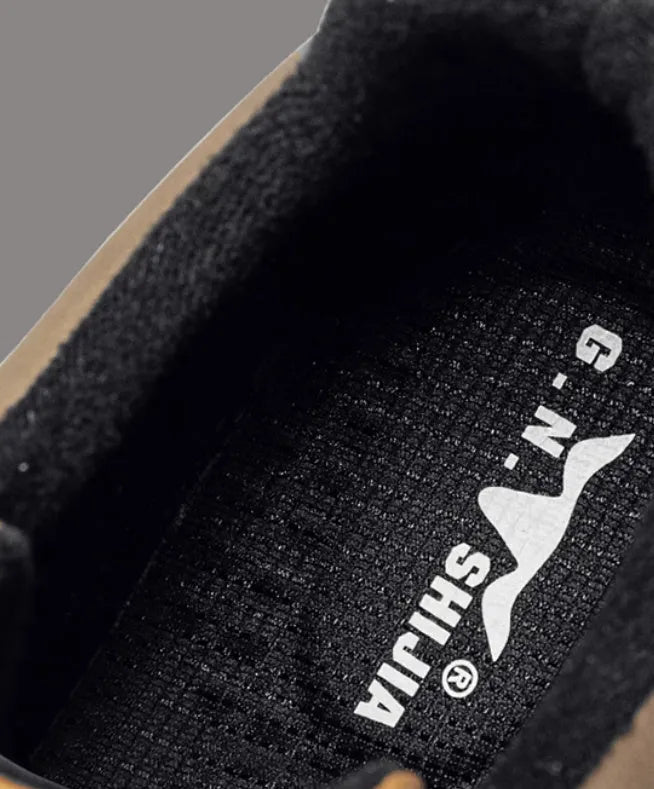 Black and white platform sneakers with thick rubber sole and microfiber leather insole.