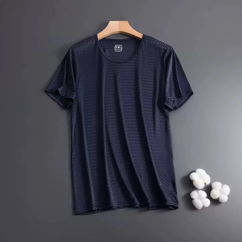 Man wearing a grey ice silk short sleeve crew neck t-shirt showing mesh fabric texture.