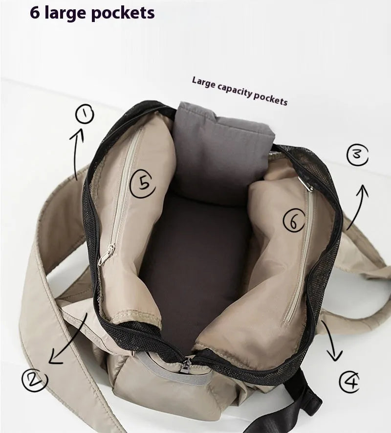 Apricot coloured cloth pet handbag with dimensions 41cm by 16cm by 28cm