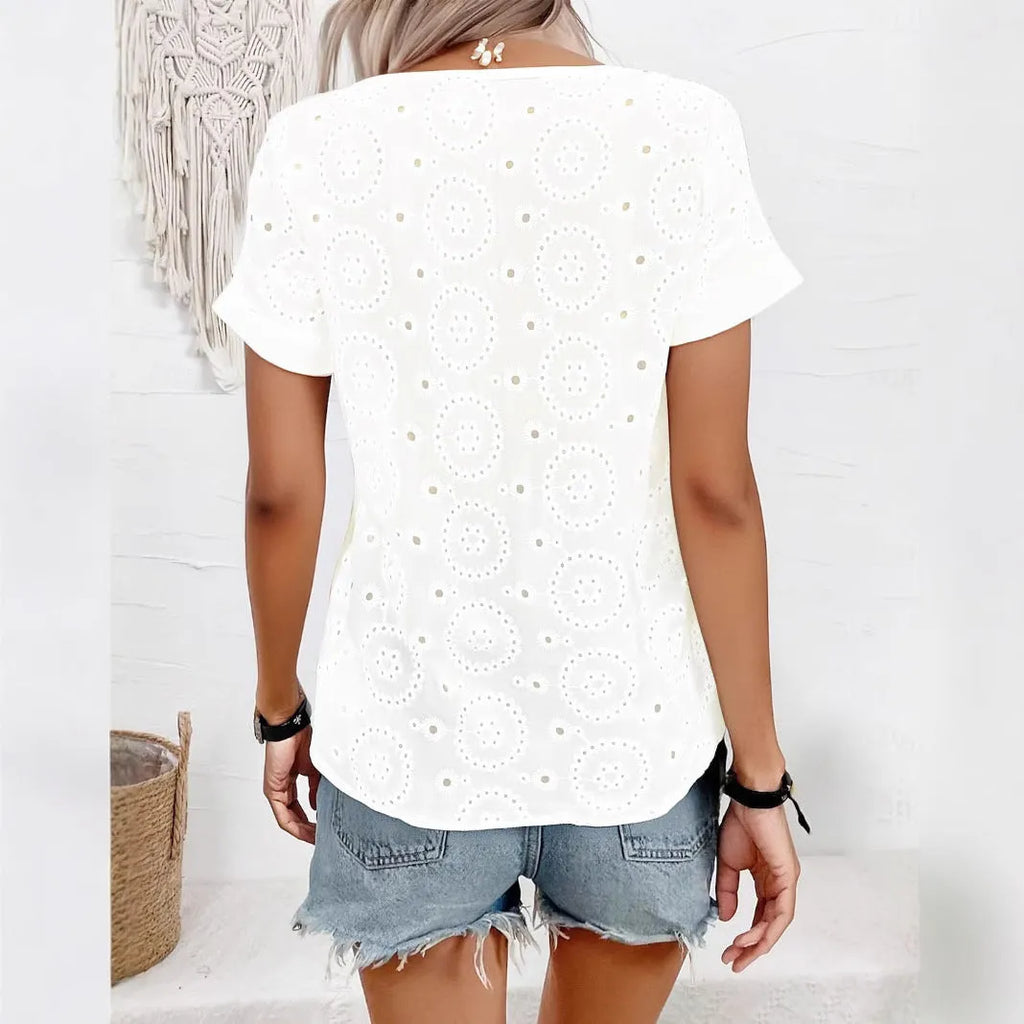 White women's V-neck T-shirt with hollow-out design detail on the front.