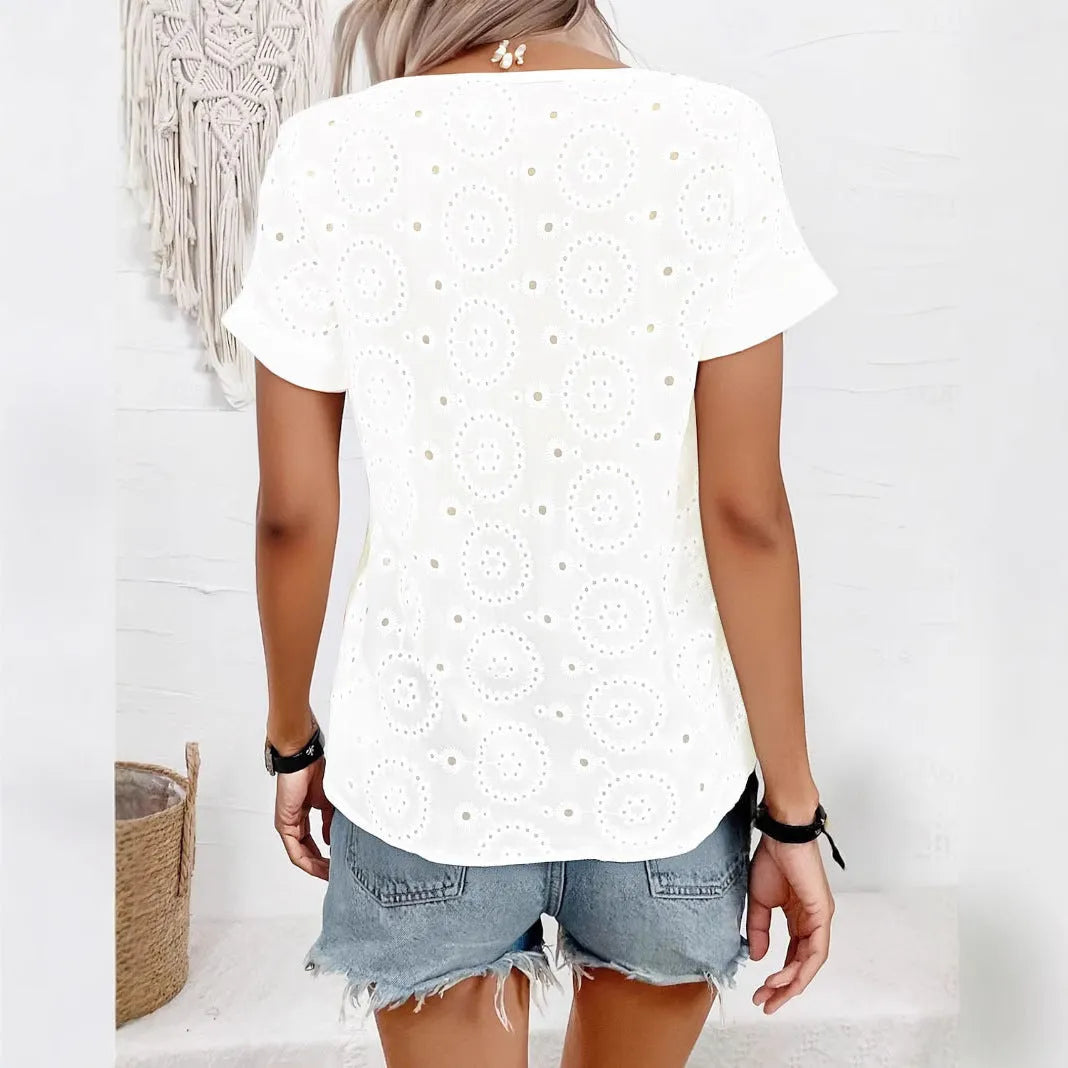 White women's V-neck T-shirt with hollow-out design detail on the front.