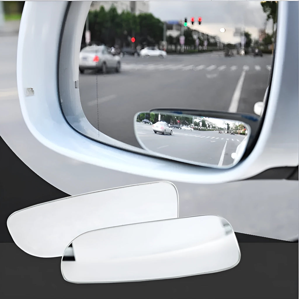 Glass adjustable blind spot mirror with angle bracket shown next to a vehicle rearview mirror.