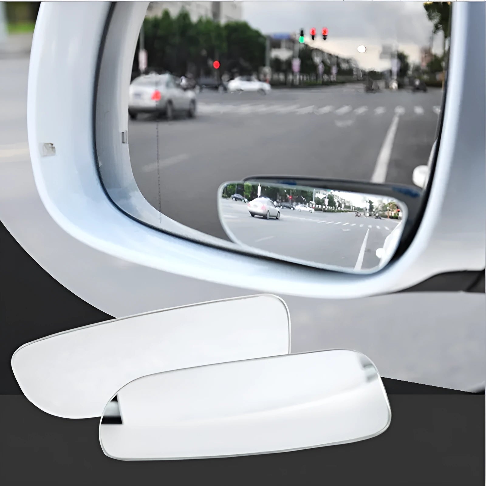 Glass adjustable blind spot mirror with angle bracket shown next to a vehicle rearview mirror.