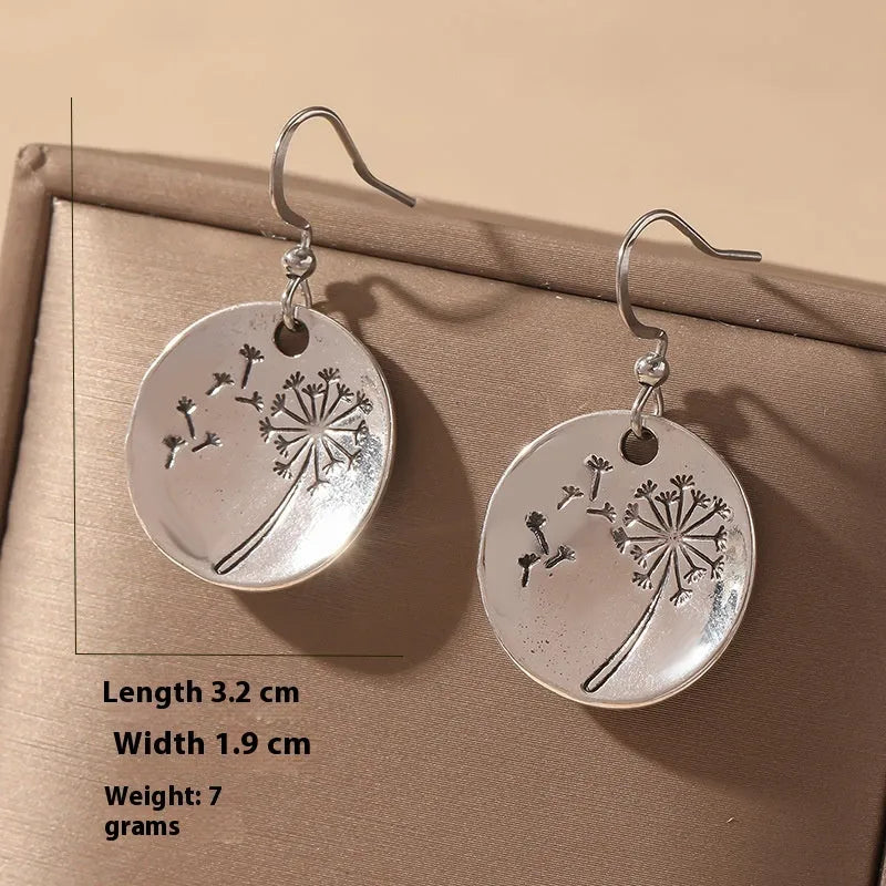 Round dandelion earrings in antique silver finish on zinc alloy for women