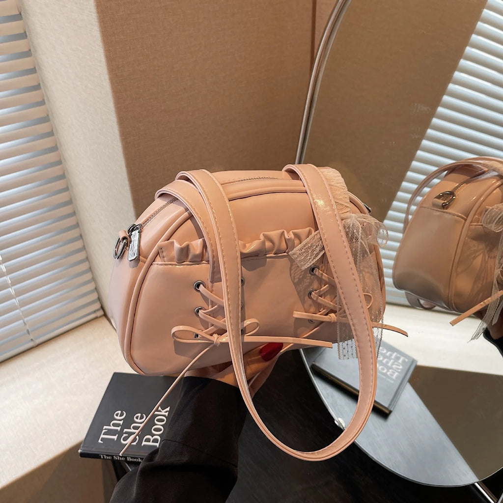 Women's bandage bow handbag in PU leather with phone compartment and sewing thread detail