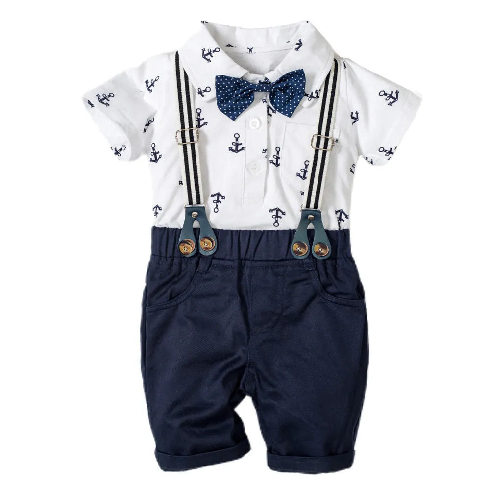 Cotton triangle romper for baby boys in blue or white with short sleeves and gentleman styling