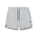 Men's grey seamless sports shorts with quick-drying fabric and straight knee-length cut