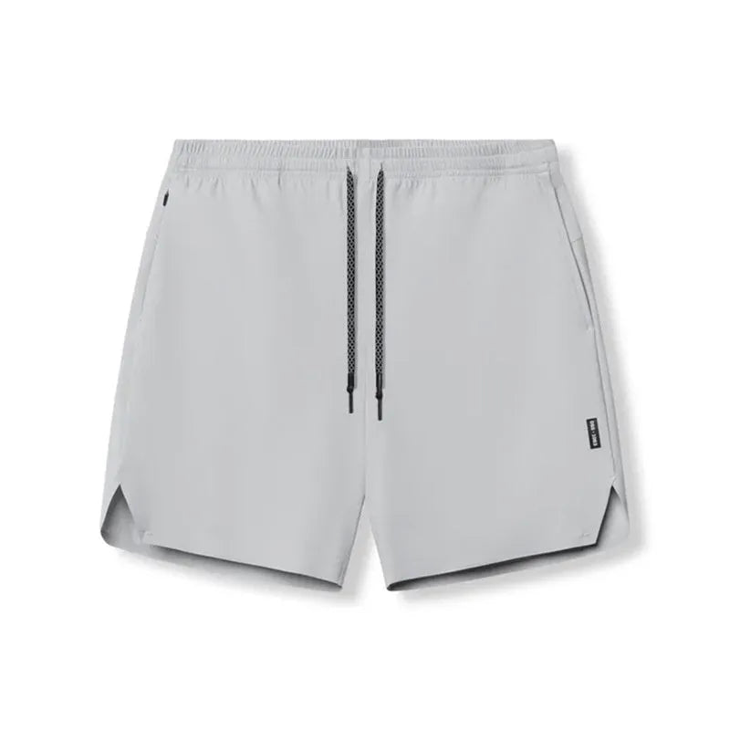 Men's grey seamless sports shorts with quick-drying fabric and straight knee-length cut