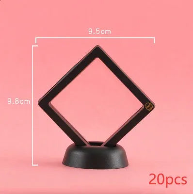 3D floating display case holding coins and jewellery between transparent membrane sheets