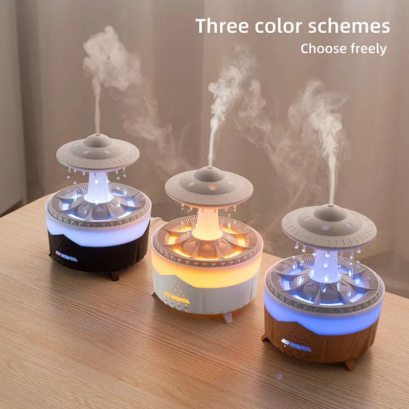 White UFO-shaped humidifier with water droplets creating mist and rain sounds