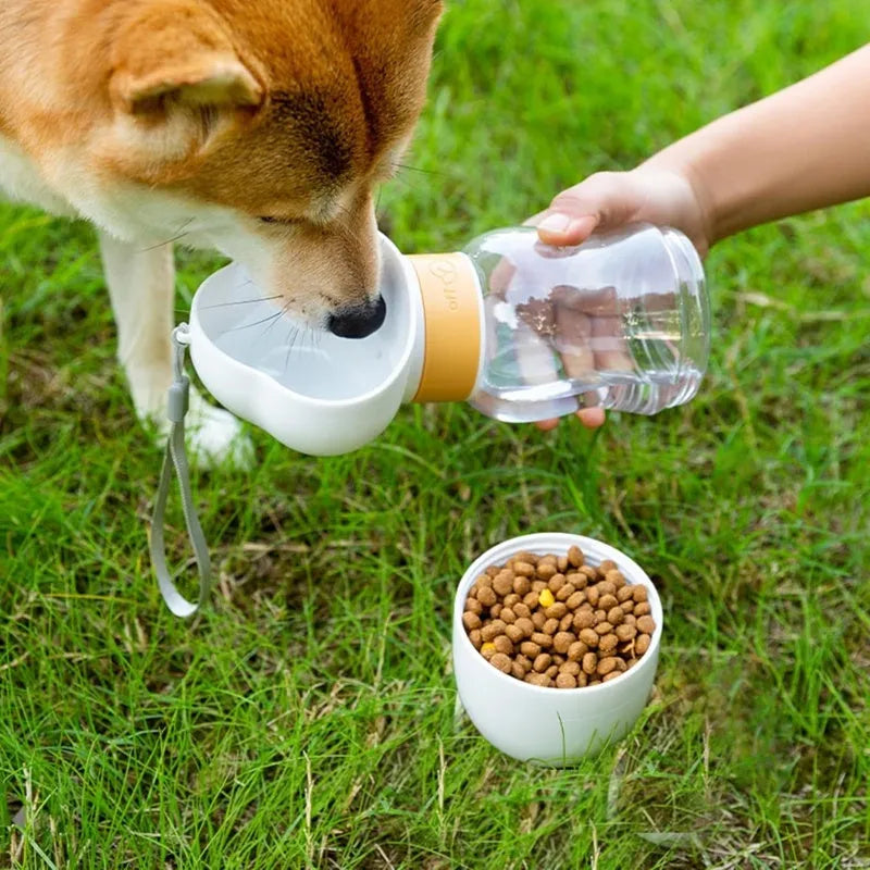Portable dog water bottle with rotary switch and food container in purple, for outdoor use