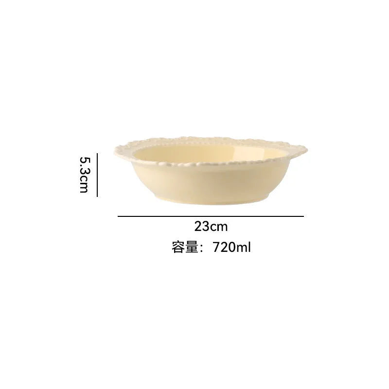 Cream ceramic vintage lace plate with irregular shape and glazed finish in white