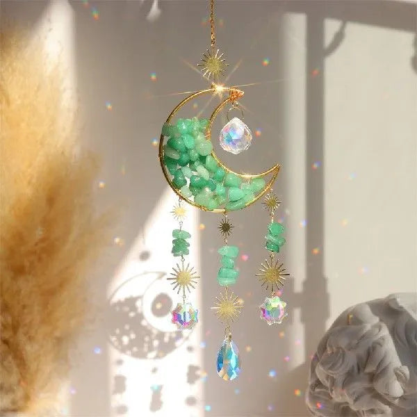 K9 crystal moon-shaped car pendant on a long metal chain, shown in blue colour option.