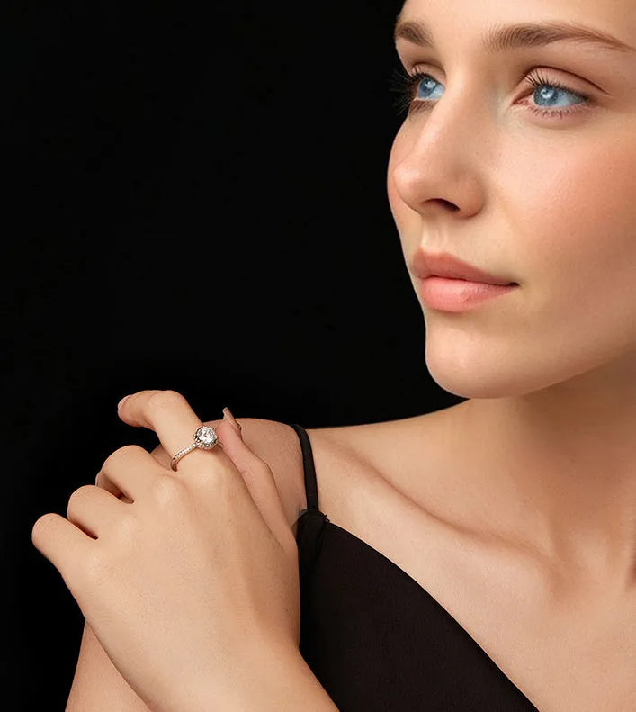 Women's 925 sterling silver flower bud ring with electroplating on white background