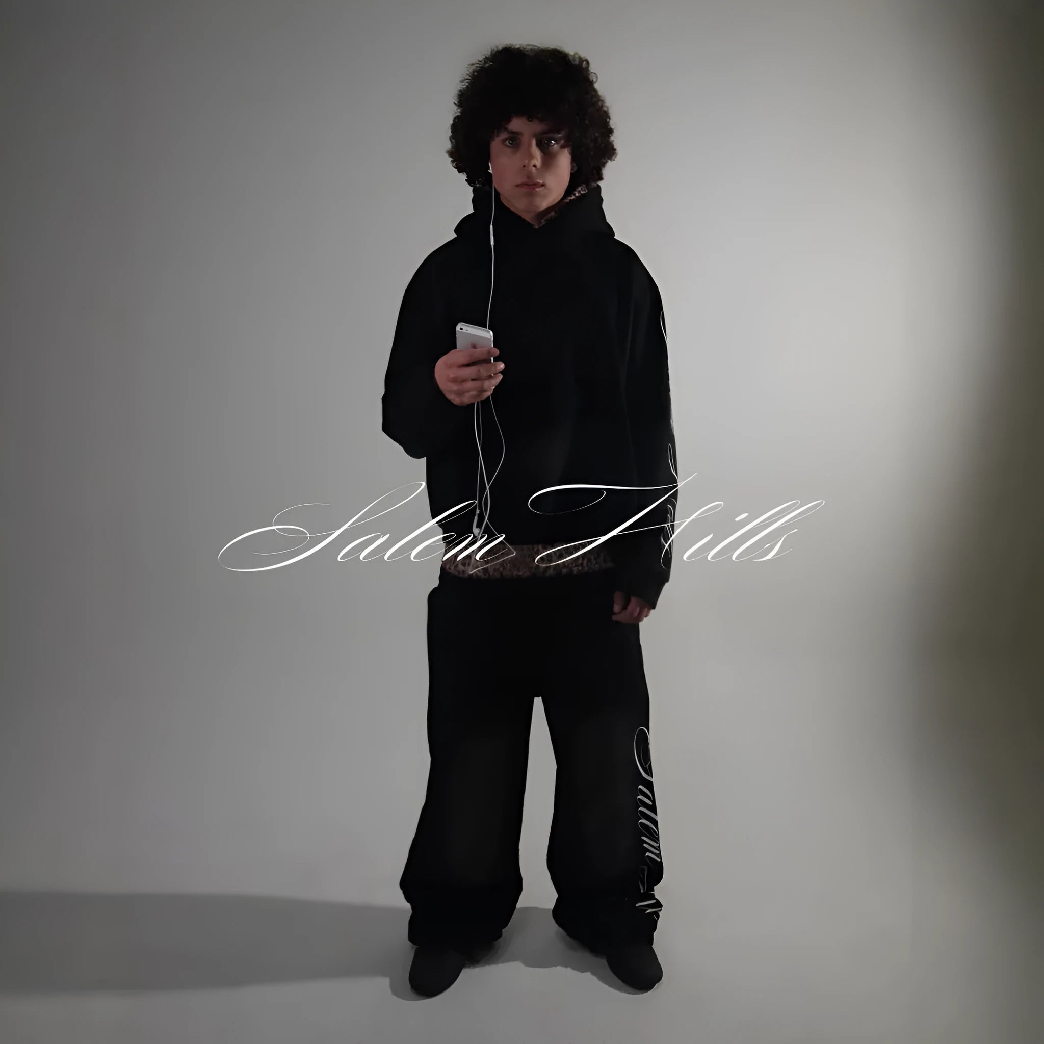 Men's grey punk print pullover hoodie and matching trousers laid flat.