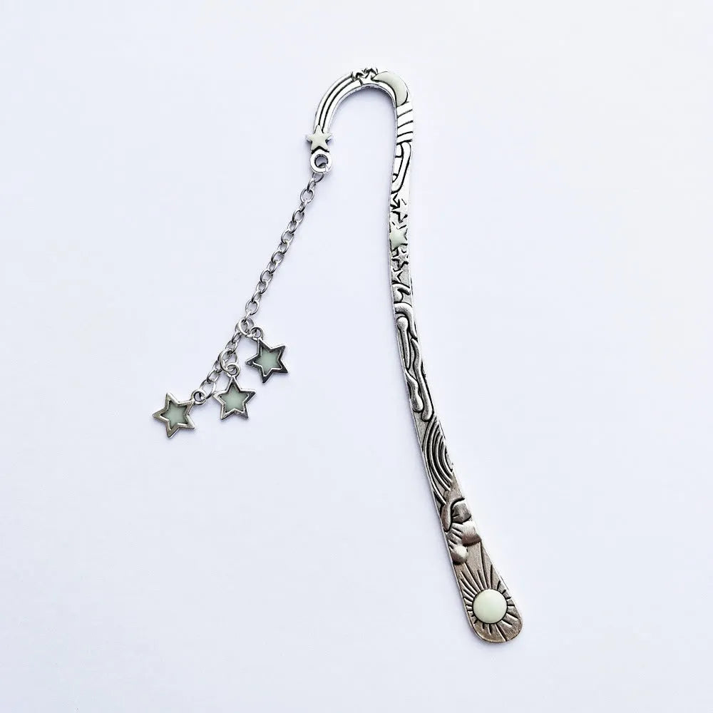 Retro five-pointed star metal bookmark with glowing elements in ancient silver finish