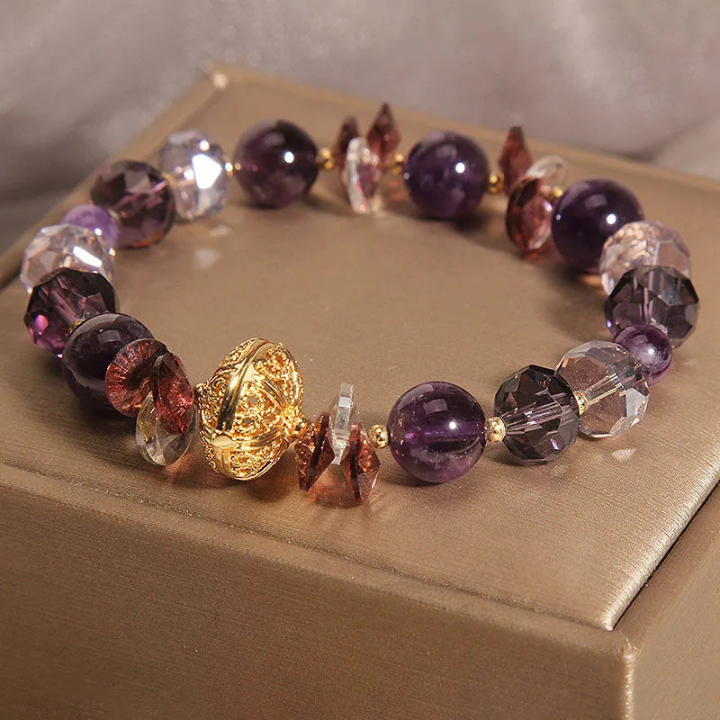 Purple crystal pumpkin beads bracelet for women with wind chime charms and rhinestone details