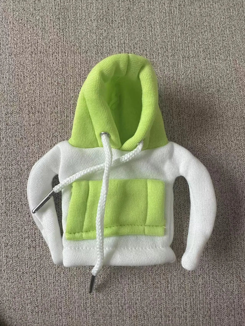 Polyester knit hood cover for car gear lever in red and white colour combination.