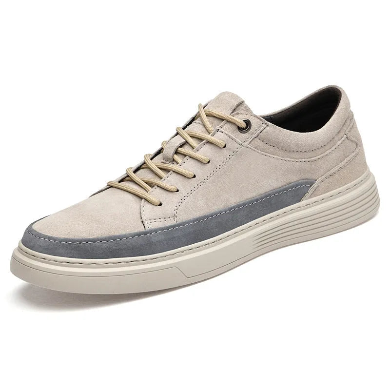 Men's grey pigskin leather casual skate shoes with round toe and flat rubber sole on a light background.