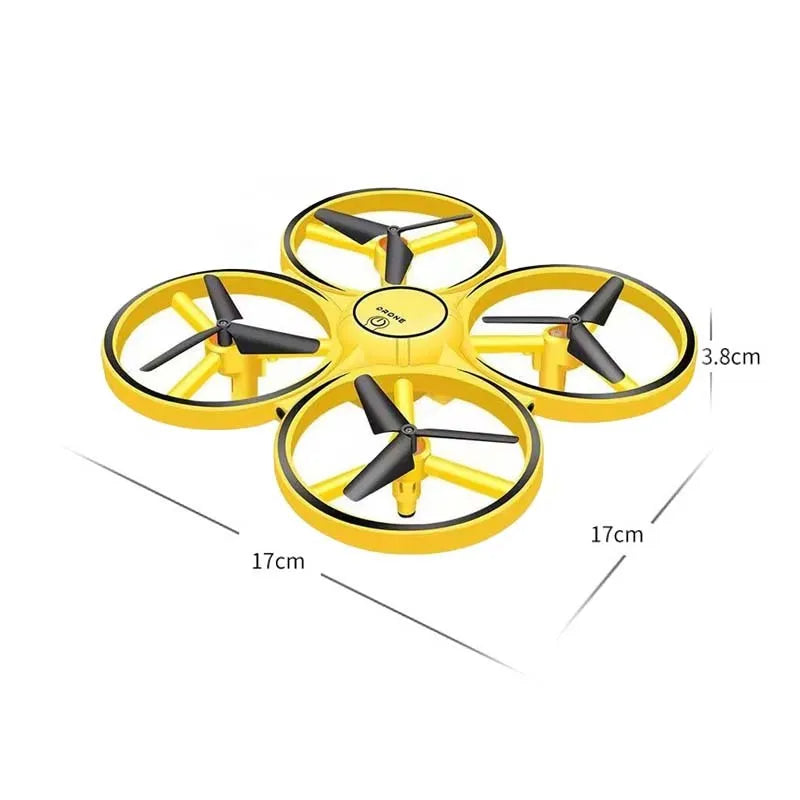 Gesture sensing flying saucer toy with ABS plastic body and four-axis design on white background