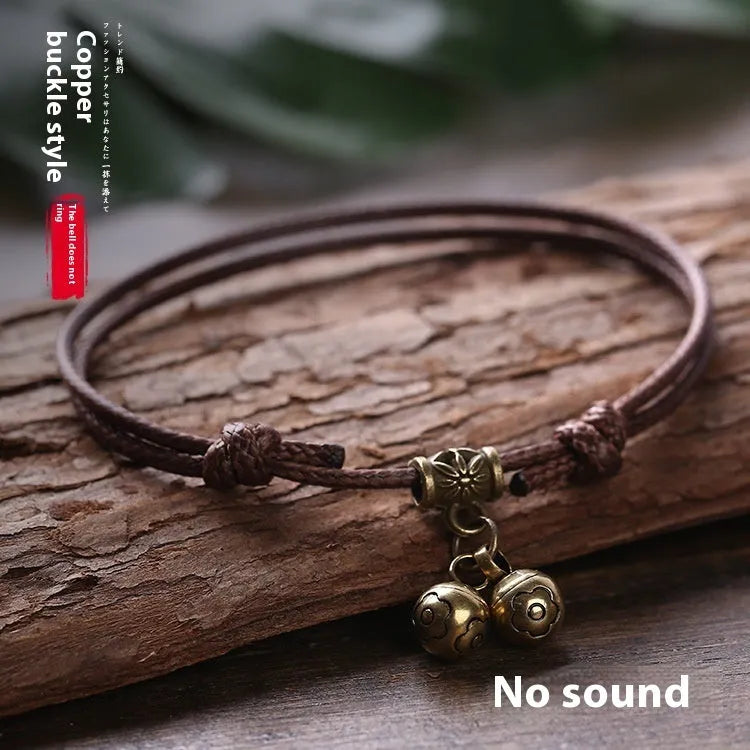 Adjustable nylon dog collar with brass bell or buckle in black, red, or coffee rope colour.