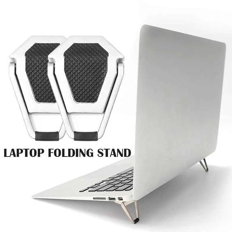 Small silver foldable aluminum laptop stand bracket with 3M adhesive strips on a white background.