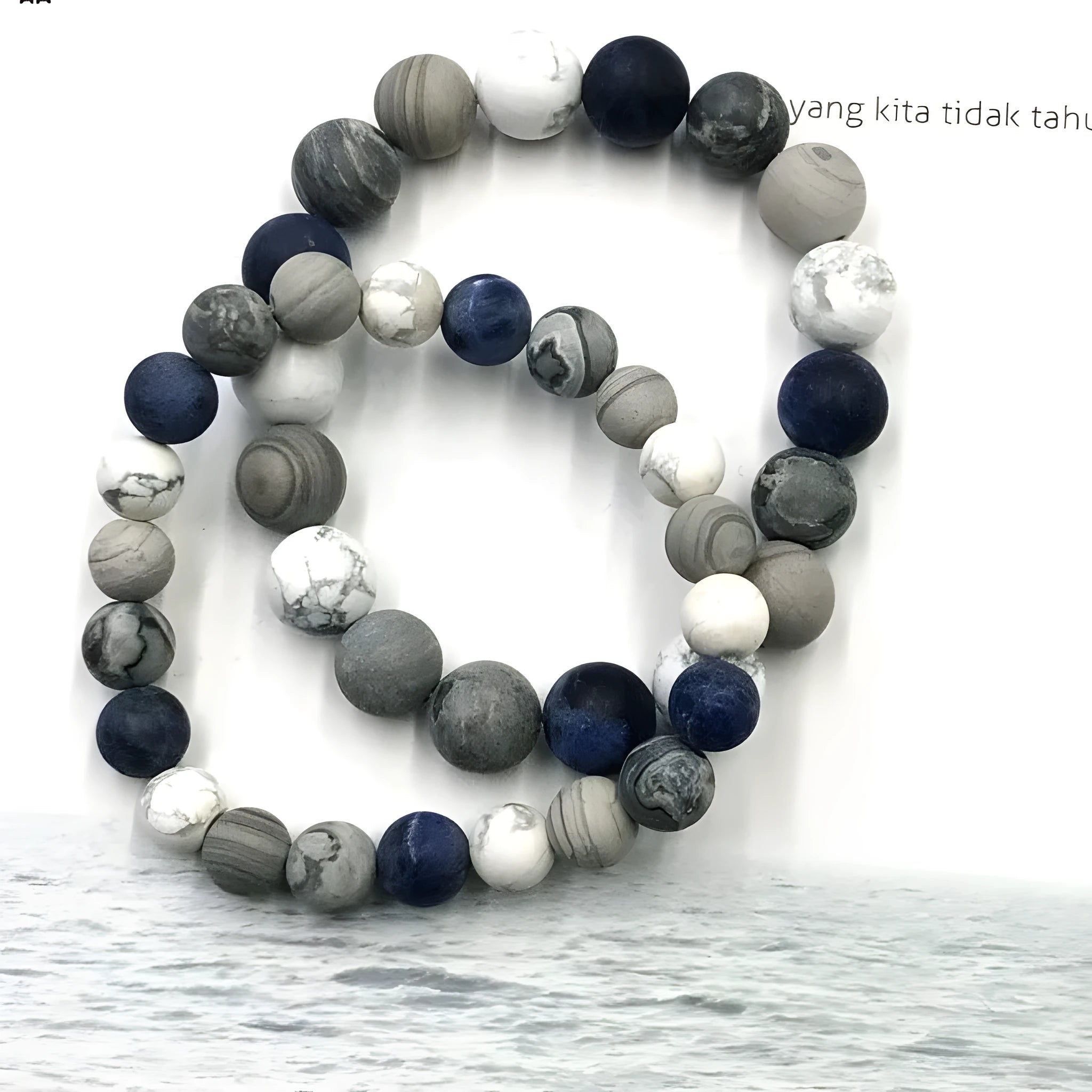 Universe Wind planet stone bracelet showing 10mm natural stone bead on adjustable hand-tied cord