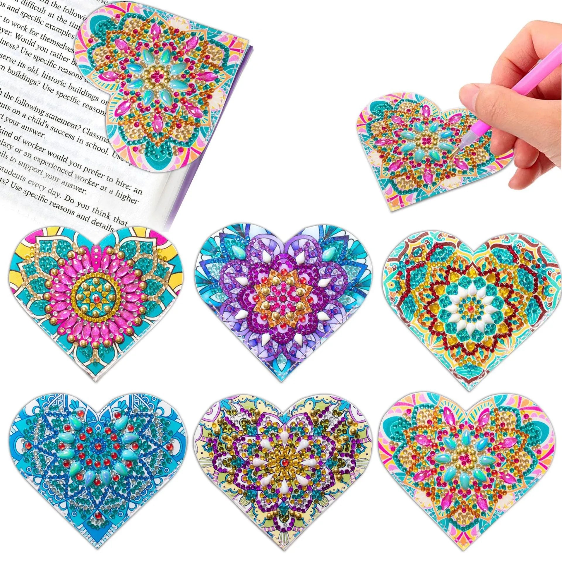 Set of six handmade PU leather flower cornerite bookmarks with stick-on crystals on a surface.
