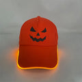 LED illuminated baseball cap for Halloween with pumpkin smile yellow light pattern