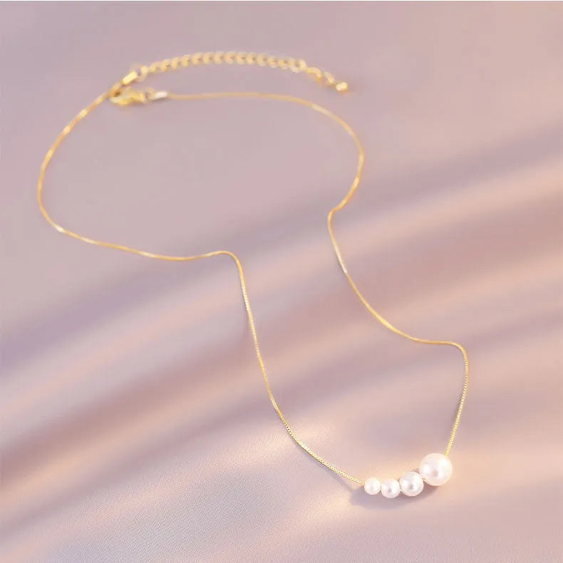 Female vintage retro imitation pearl necklace with geometric shape, adjustable 21-50cm perimeter, available in multiple colours