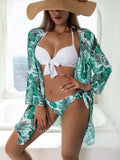 Women's three-piece bikini swimsuit set with mesh split design showing top, pants, and coat