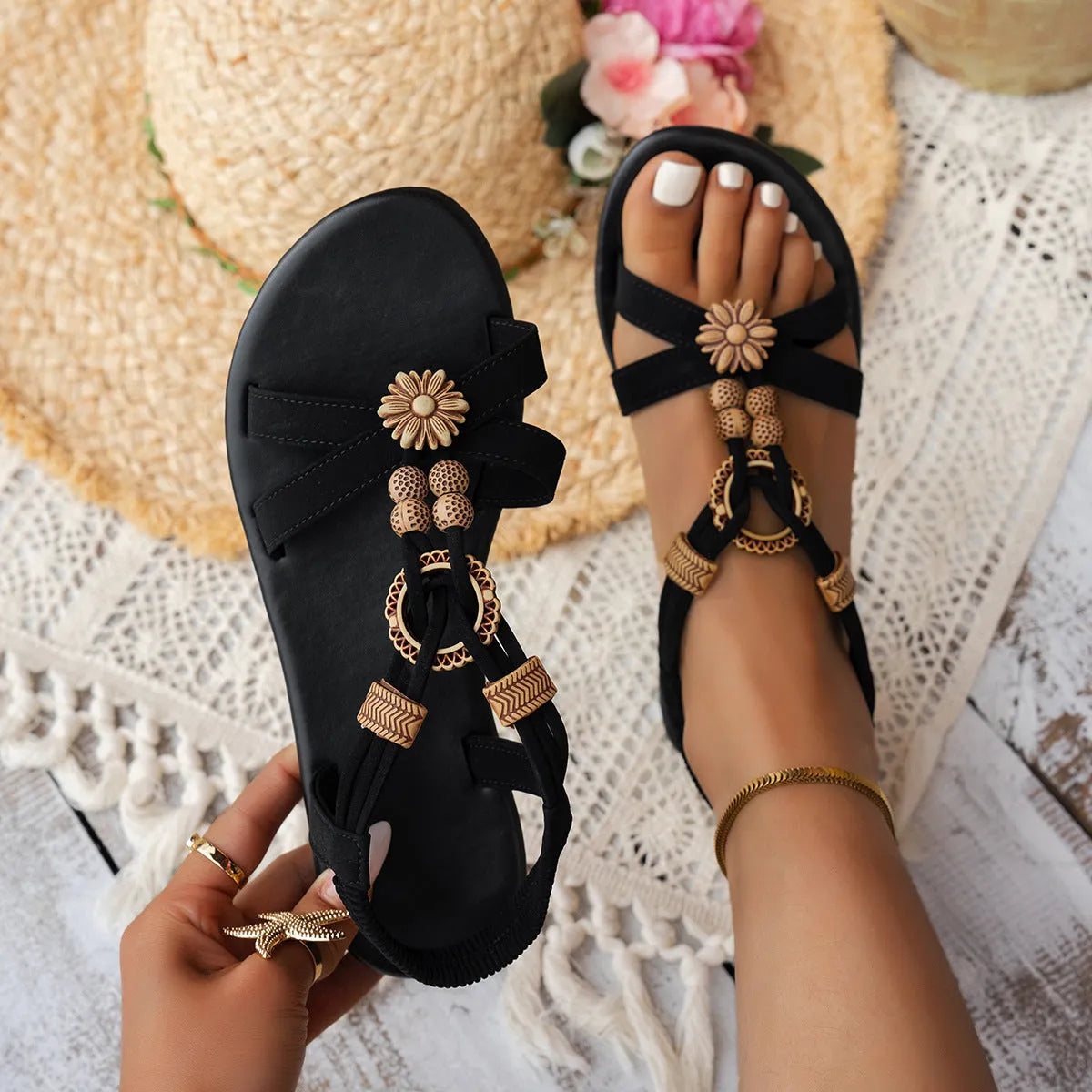 Black ethnic style women's flat sandals with beaded decoration and elastic band fastening