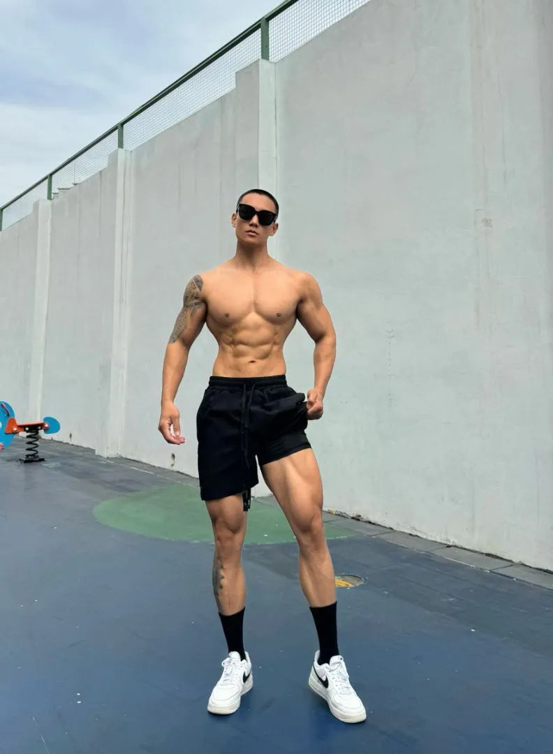 Men's Ice Silk quick-dry double-layer casual shorts in nylon fabric.