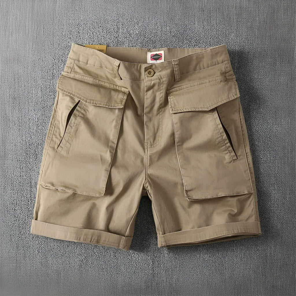 Men's stretch cotton cargo shorts in army green colour showing multiple pockets and straight-leg fit.