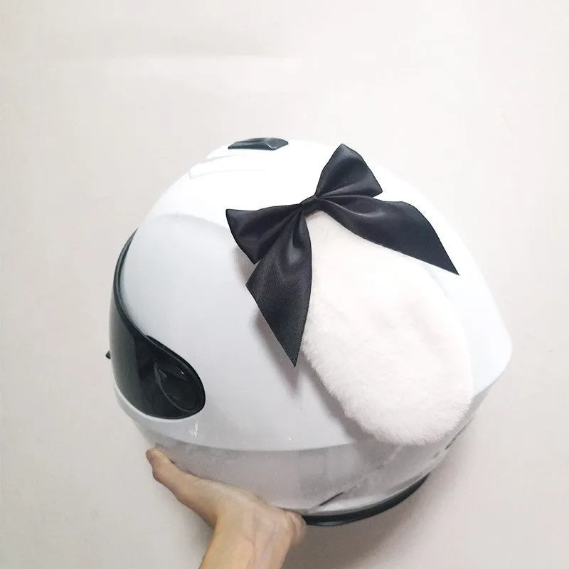 Carbon fibre rabbit ears motorcycle helmet decoration in various colours on a black helmet.