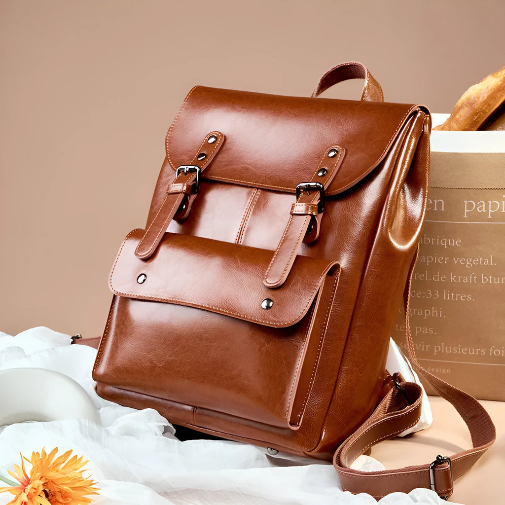 Genuine leather women's computer backpack in black, brown, and coffee brown colours